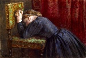 woman-kneeling-in-prayer